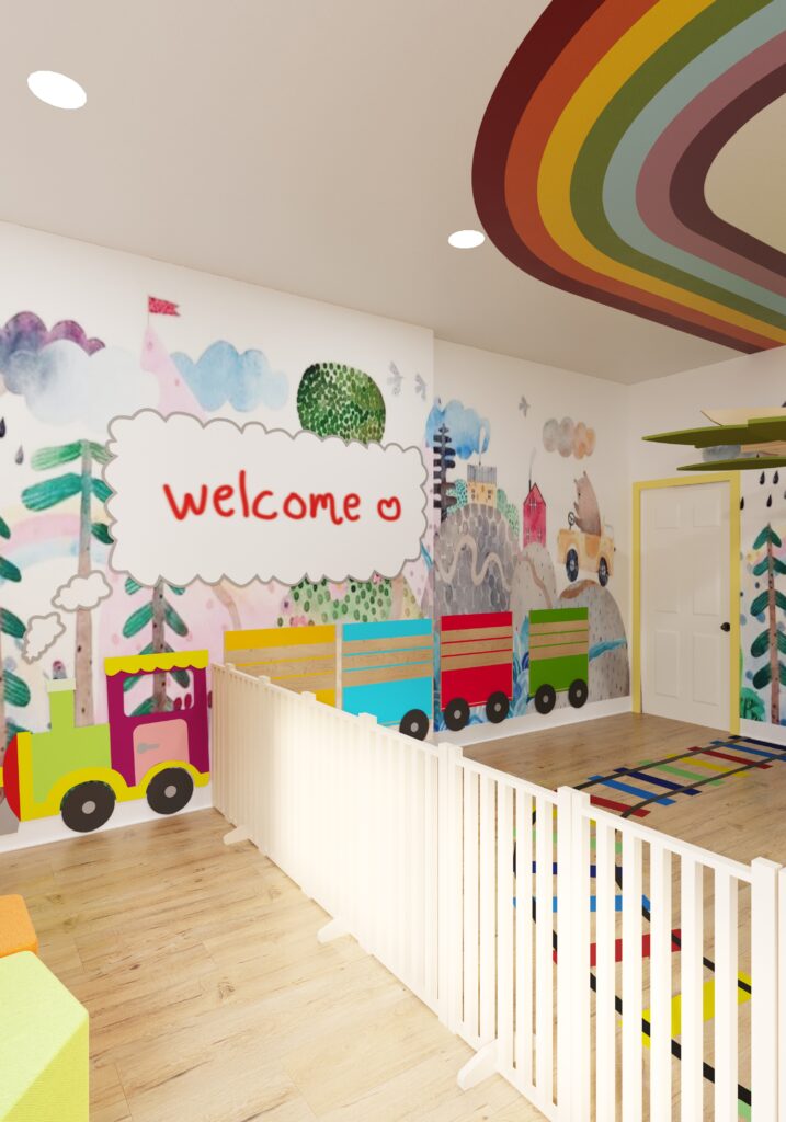 preschool welcome area with colorful train wall, rainbow ceiling, and child safe fence