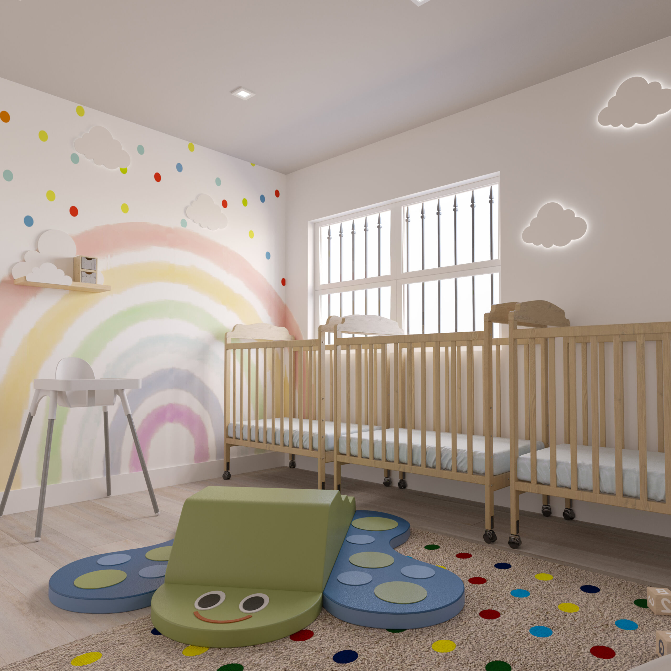 daycare infant room with wooden cribs, soft play mat, rainbow mural, and cloud wall lights