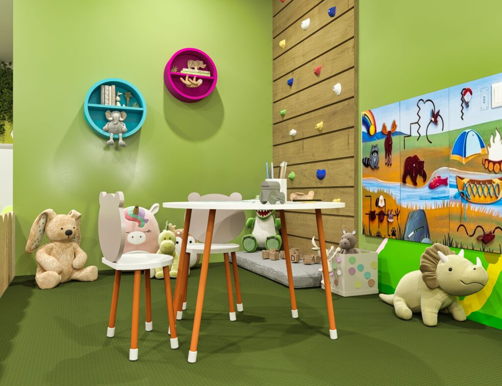 jungle pediatric dental play area with activity table and stuffed animals
