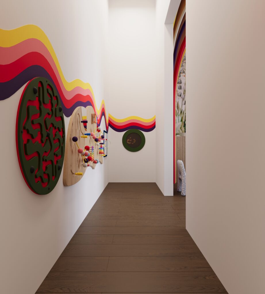 pediatric dental sensory hallway with interactive wall games and rainbow graphics