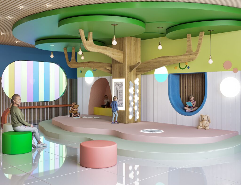 nature inspired indoor play lobby with large tree feature and soft seating